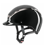 Black riding helmet with chrome accents on a white background